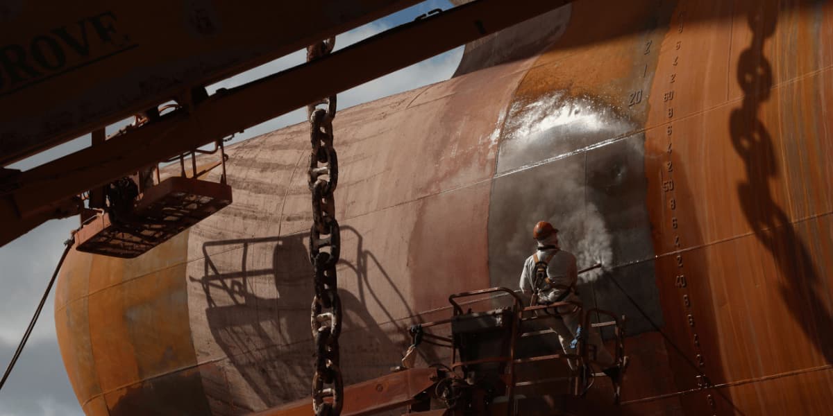 Industrial welder performing structural welding for marine and offshore equipment