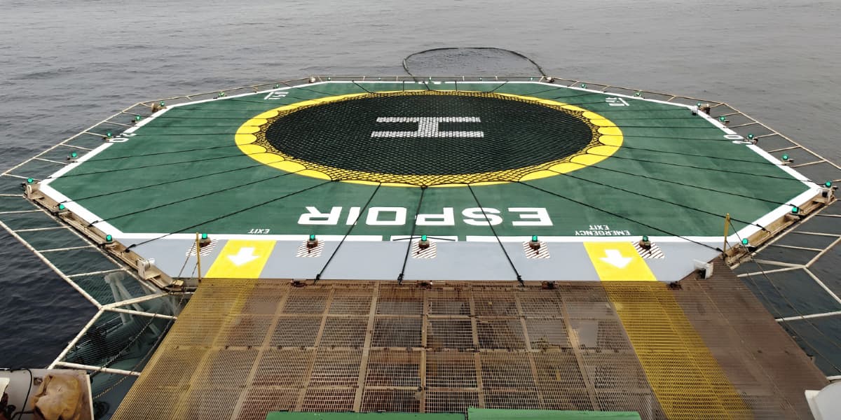 Completed offshore helideck with protective coating and safety markings